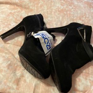 Never worn heeled booties